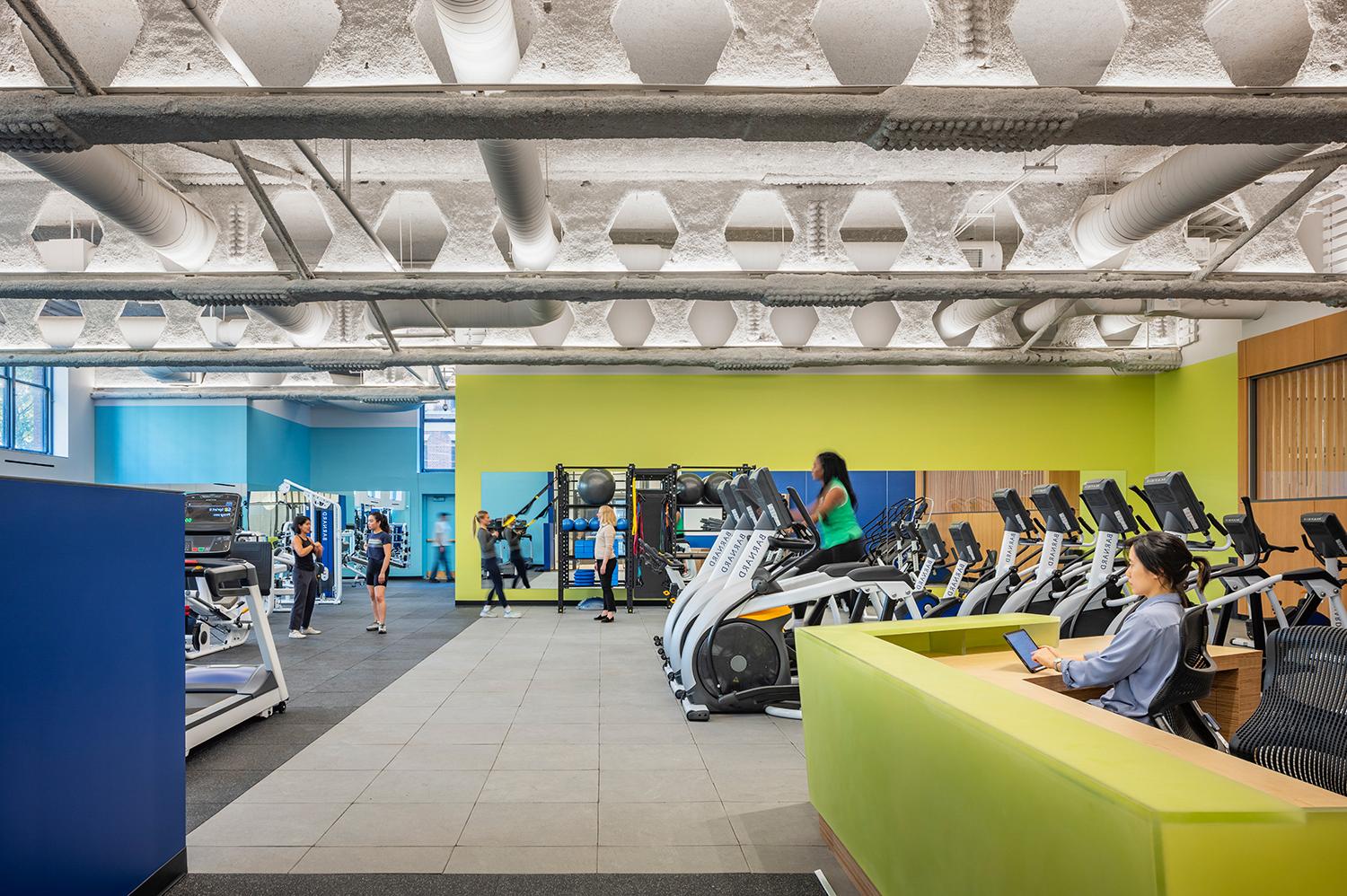 The entrance of the LeFrak gym shows bold colors and gym equipment