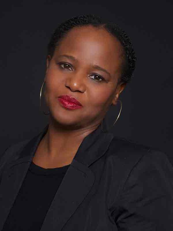 Author Edwidge Danticat in a black suit